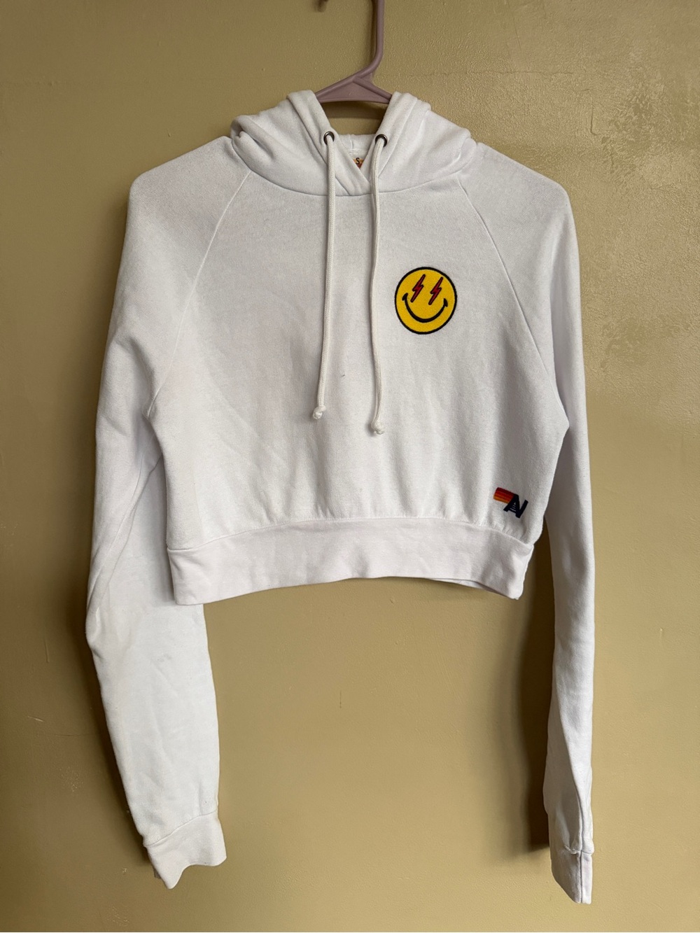 Aviator Nation white cropped hoodie with embroidered smiley face